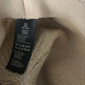Creme colored fedora with brown woven belt